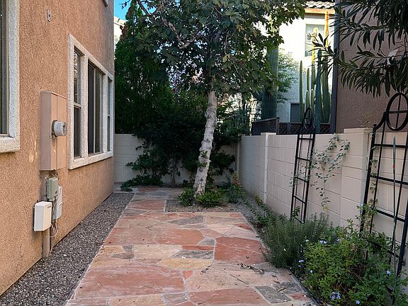 Shaded with mature mission fig tree that has sweet figs. Back yard is on a drip system and maintained by tenant.