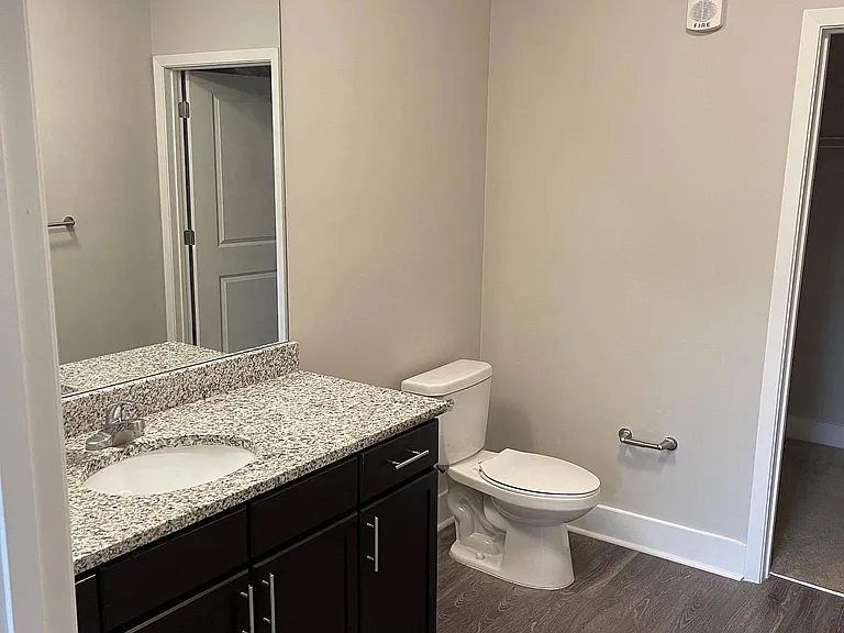 En-Suite Bathrooms with Granite Countertops
