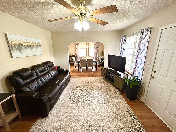 Living room with view of dining room.
