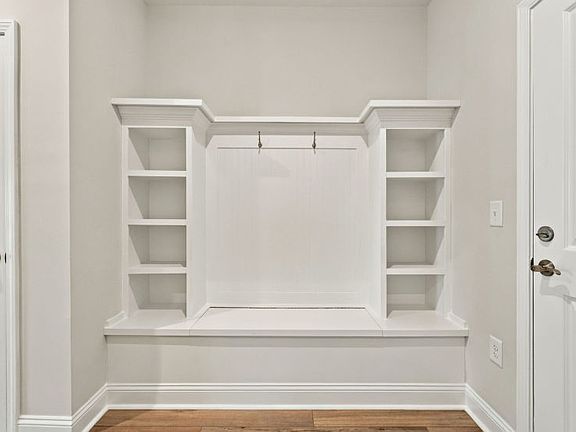 Practical drop zone for easy storage and organization.