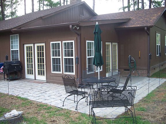 300 sq ft patio wraps around the sunroom