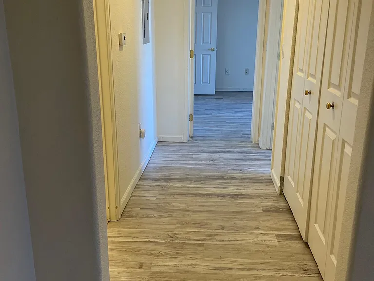 Hall Way - 2nd Bathroom on the left and Laundry Room on the right
