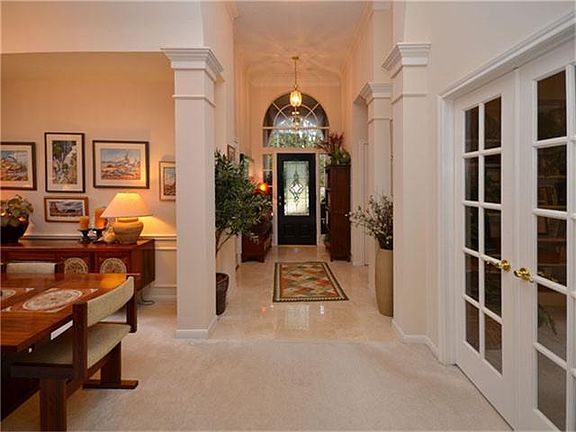 Entry opens to Formal Dining and Study