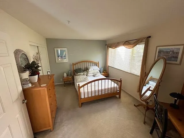 Guest bedroom with queen bed and private bathroom