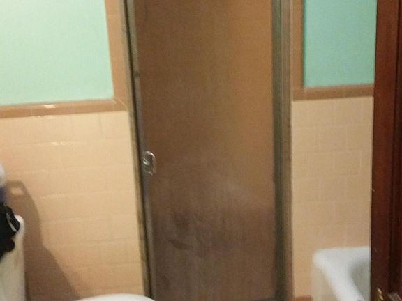 Bath with tub and shower
