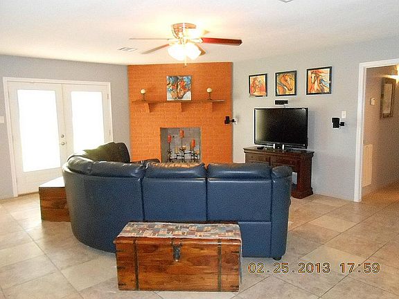 Large living area and wood burning fireplace