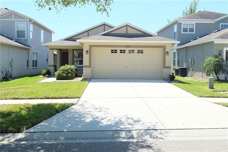Front of House - Great Curb Appeal - Gutters/Downspouts, Freshly Painted Exterior-2017, Video Surveillance, Curbing for landscape, Hurricane window tinting.