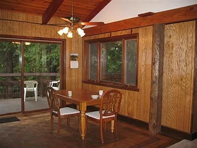Diningroom with glass slider to back deck