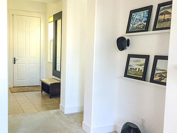 Media niches and view to the front door.