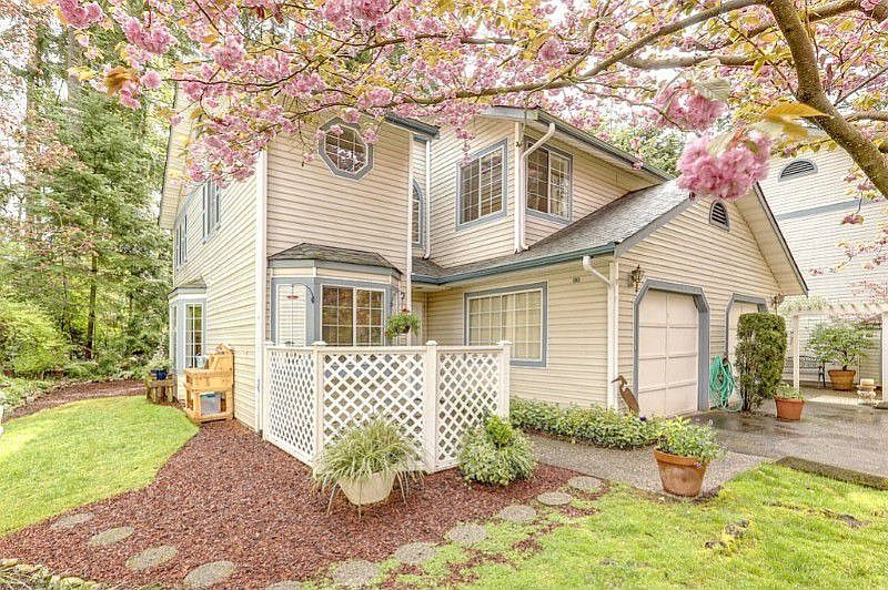 Exceptional two story home located on quiet, private cul-de-sac with fabulous NW gardens.