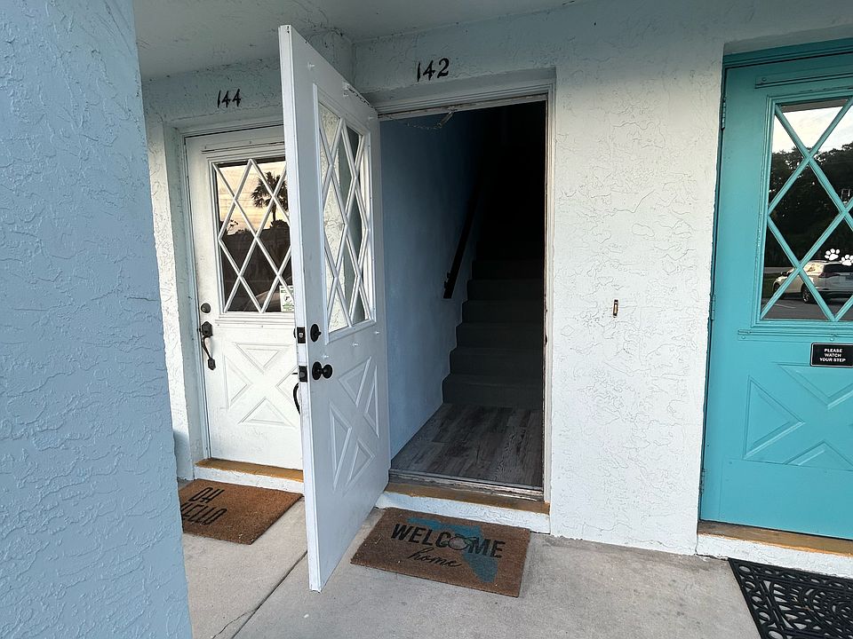 Front door to upstairs apartment.