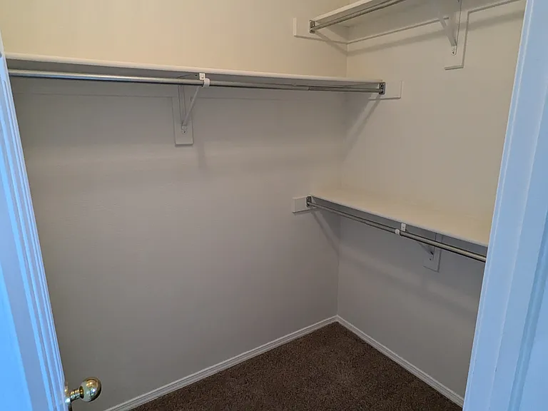 Master bedroom walk in closet