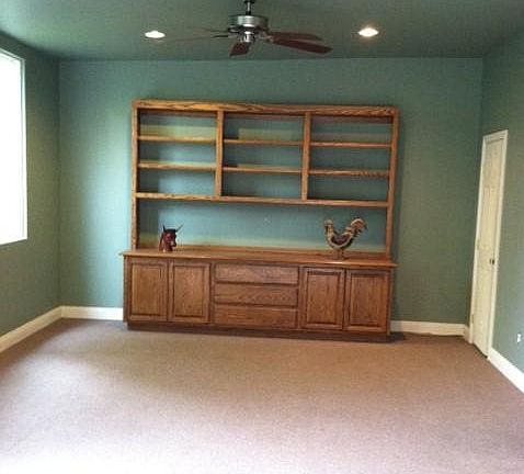 This room is currently being repainted "Swiss coffee" and new carpet. Approximately 500 sq. foot addition.