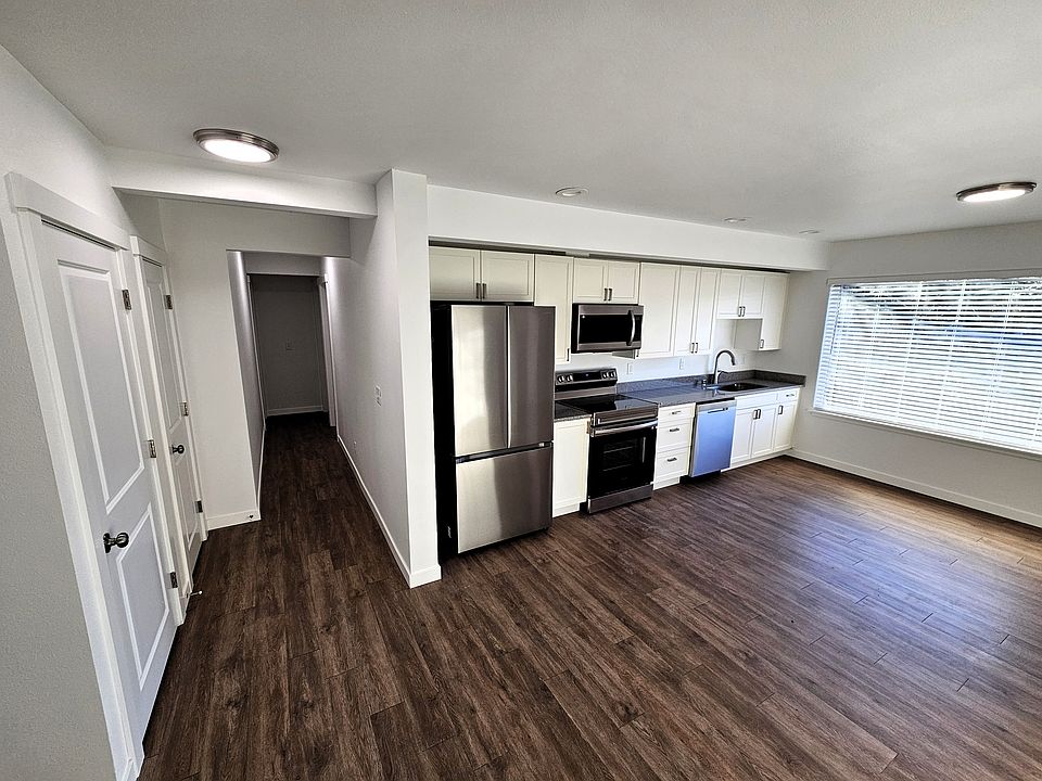 Large, open concept kitchen and living area.