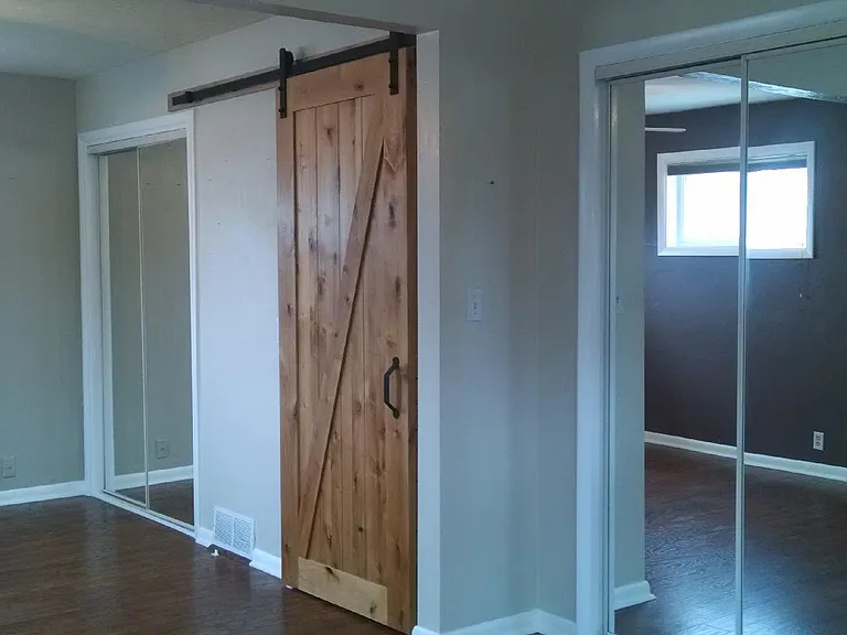 Master Bedroom - Mirrored Closets - Barn Door Entrance