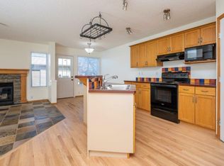 53 Bridleridge Gdns SW, Calgary, AB T2Y4C9