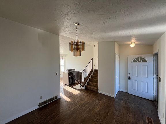 Stairs lead to Master Bedroom, Bedroom #2, and Jack-and-Jill style Bathroom