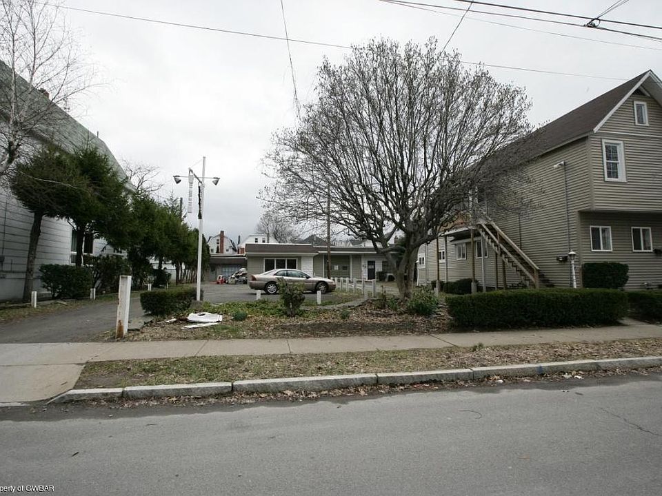 Garage/Warehouse and Apartment Building
