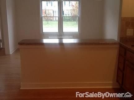 Kix half wall looking into Dining Rm
						:
						A lot of counter space! This half wall gives more of an open feel to rooms.