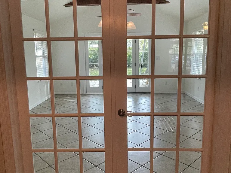 French doors into sunroom