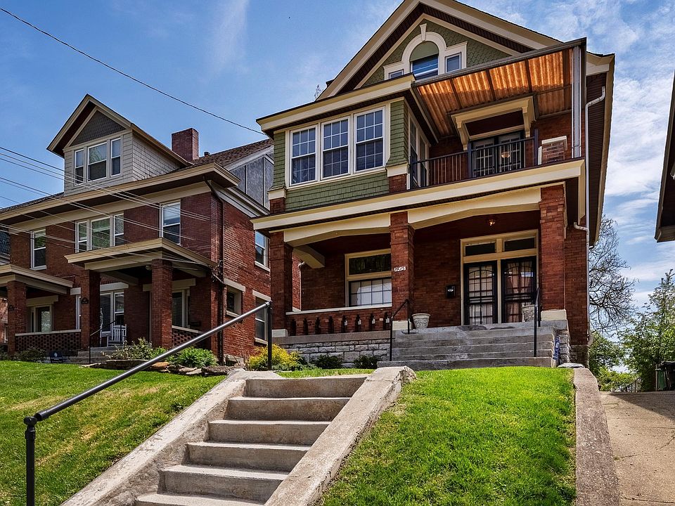 Two-story brick building. Second-floor apartment for rent. Park the car in the rear or on street.