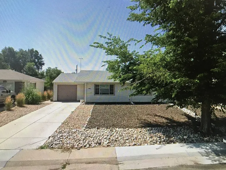 Front yard that is xeriscaped, needs no water or mowing