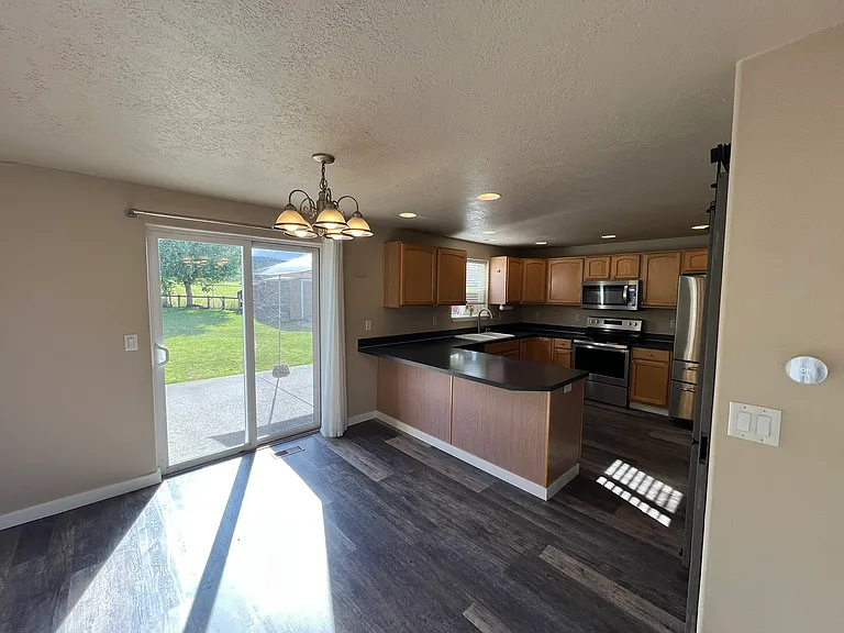 8642 NE Barberry Dr — Photo 3