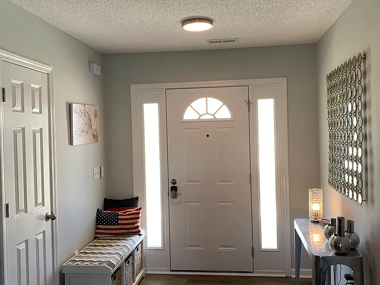 Front entry with coat closet.