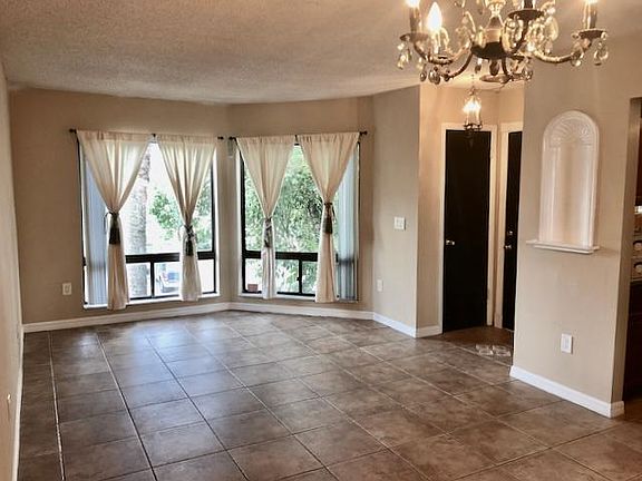 Large living room with plenty of windows