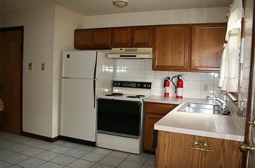 Kitchen with tile flooring