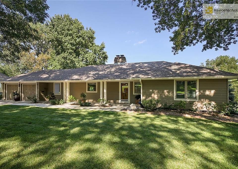 Larger than it looks, this 4 bed Leawood Estates home sits on a spacious lot with a 2 car attached garage and extra parking spot