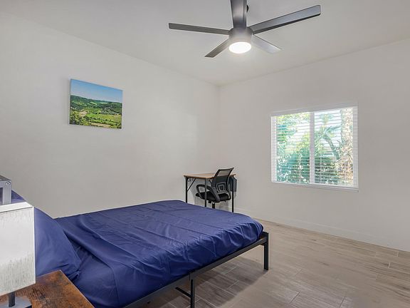 Spacious and clean room with huge window overlooking the trees.
