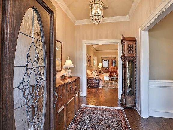 WELCOMING ENTRY WITH HARD WOOD FLOORS