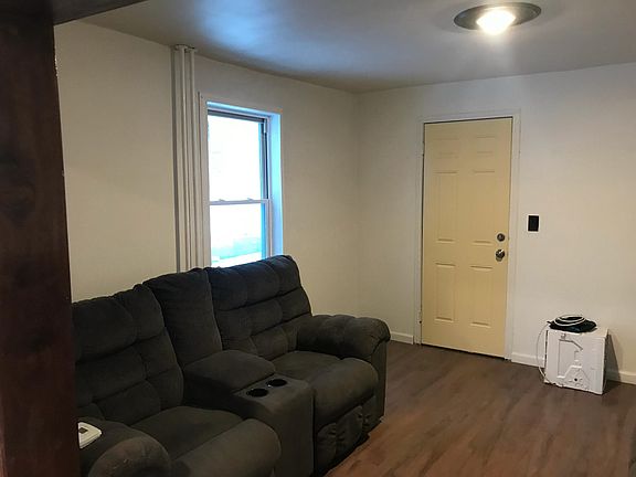 Living room looking at front door exit (shared).