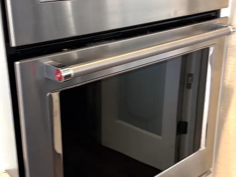 Kitchen-Aid conventional / convection oven + microwave combo.