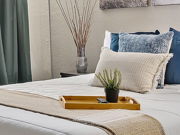 This queen bed is so comfy and cozy!