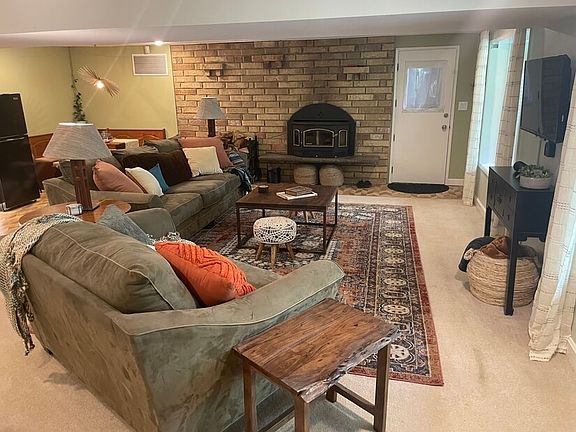 Living room w/fireplace and flat screen TV