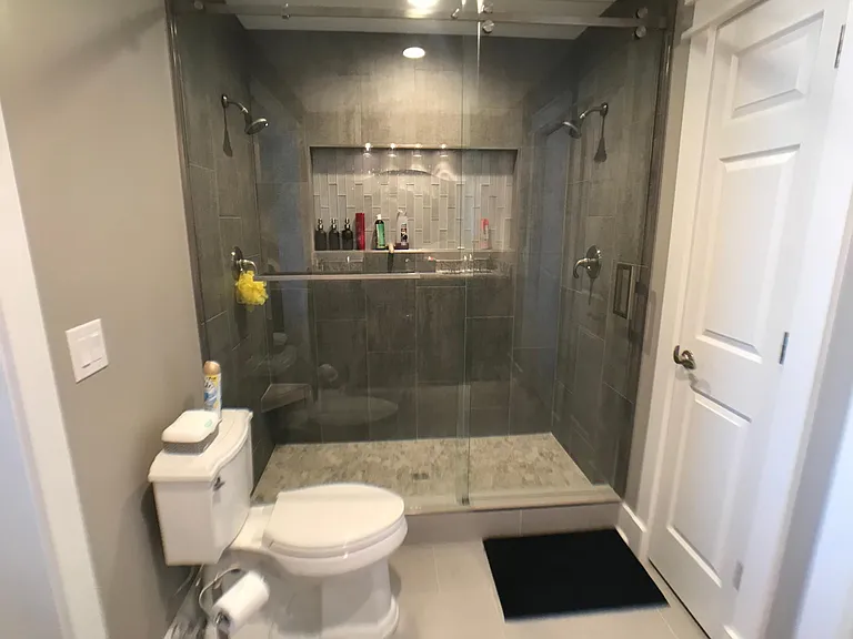 Master Bath with glass enclosure and double headed shower