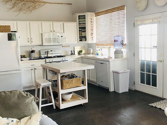 Bright, white kitchen with updated appliances