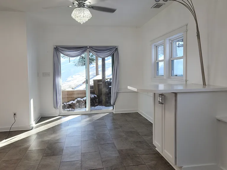 LIVING ROOM - FACING OUT BACK DOOR