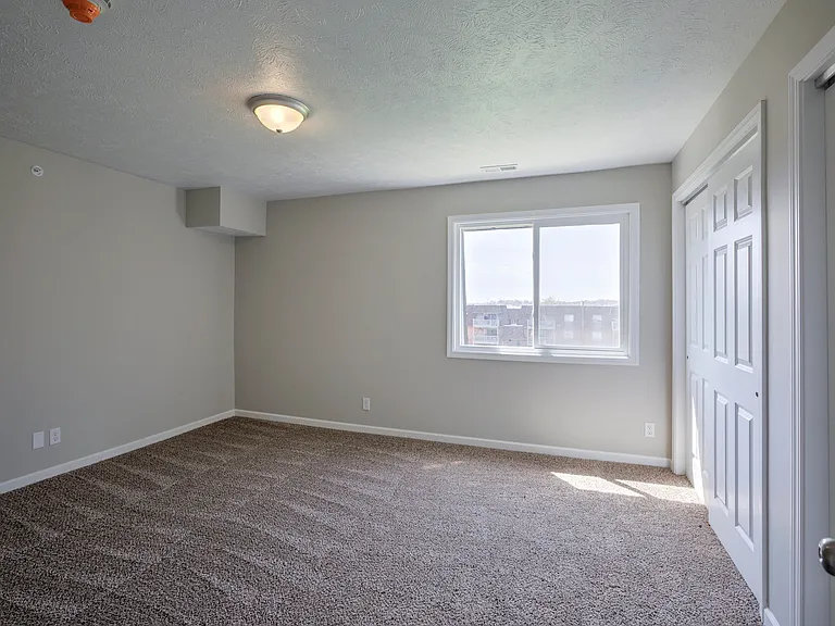 Welcome to The Pines at Q Plaza Apartments, where comfort meets modern living. Enjoy spacious interiors featuring plush carpeting and ample natural light. Your new home awaits. Schedule a tour today to see all that we offer!