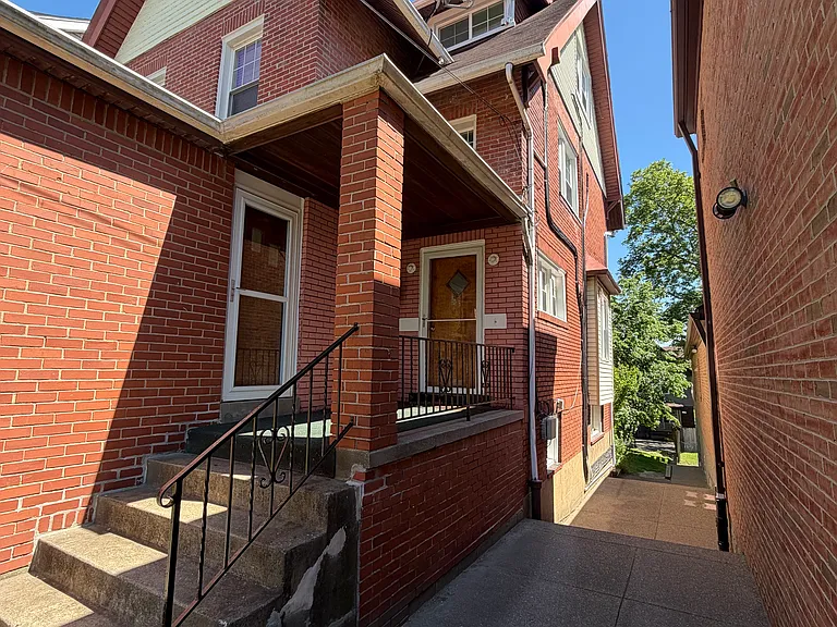 Front of house/side alley