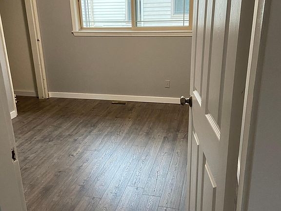 bedroom off of dining room