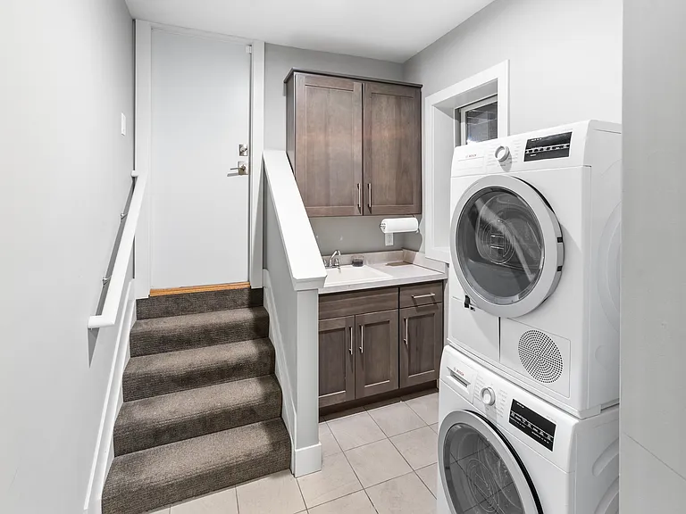 Laundry Room - looking toward door to Garage, located one floor down from Kitchen