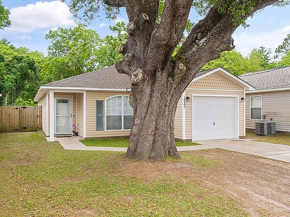 Front yard with tree