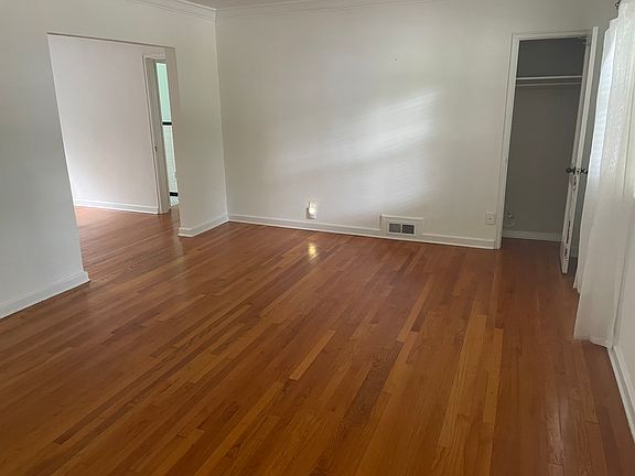 Living room, coat closet on the right