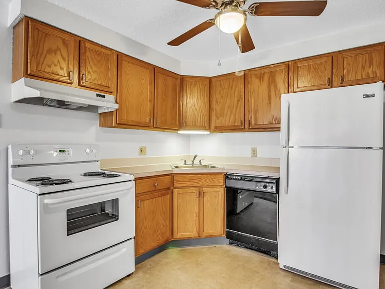 Village Center Apartments — Photo 12