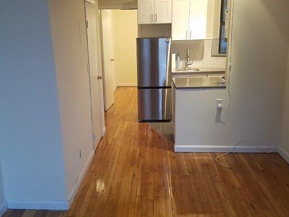 2nd image of 255 E 10th St APT 2C