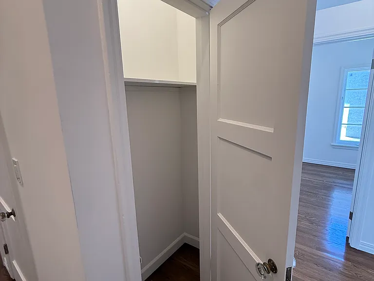 Utility Closet For Personal Items off Front Entry