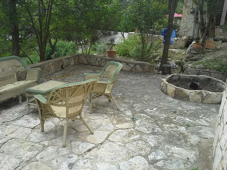Stone patio with fire ring